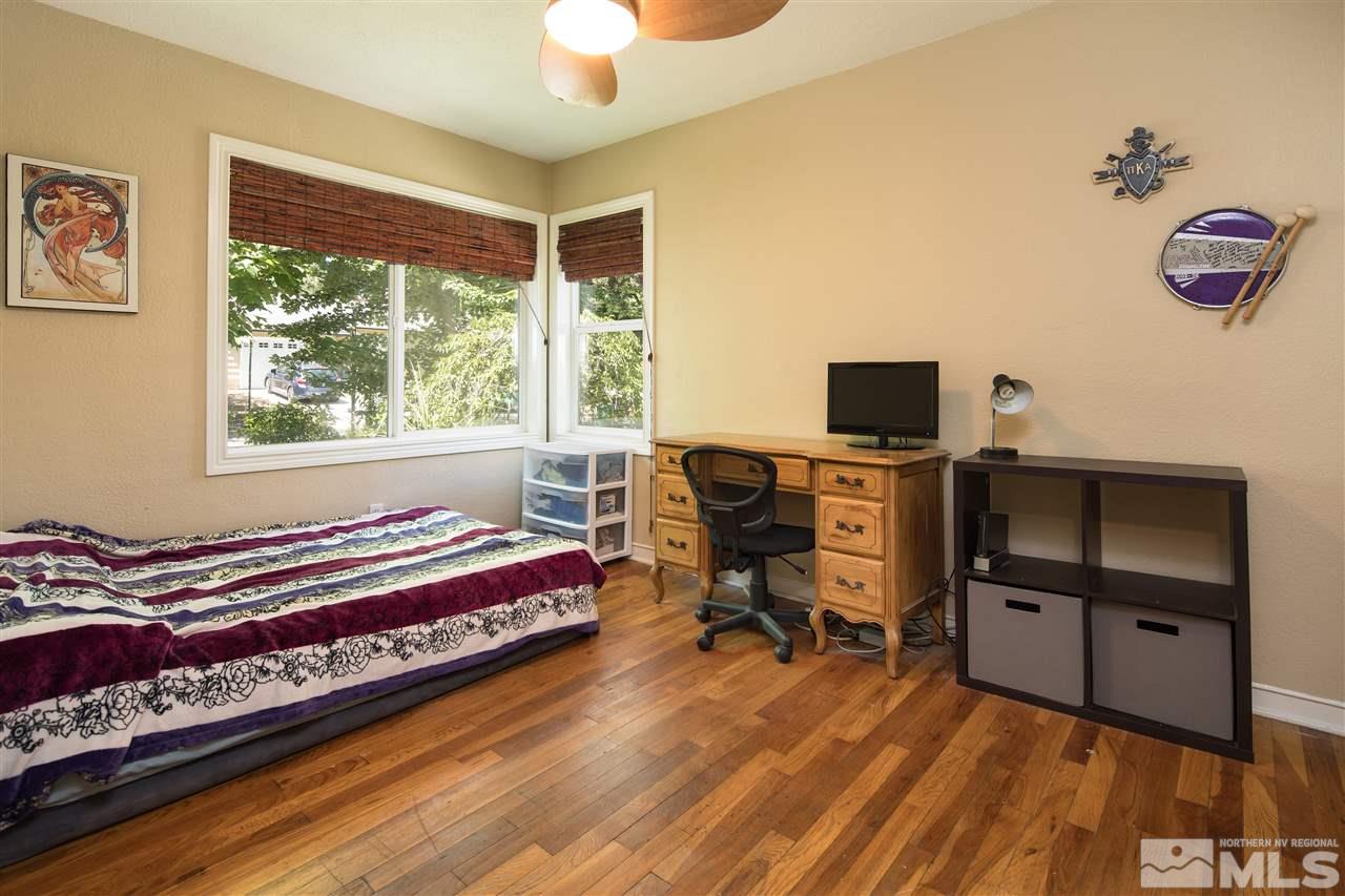 70 Bisby Street Reno, NV 89512 - Photo 14 of 25 a bedroom with a workspace