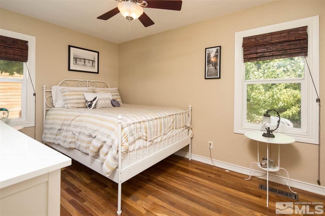 70 Bisby Street Reno, NV 89512 - Photo 16 of 25 a bedroom with a bed and a table