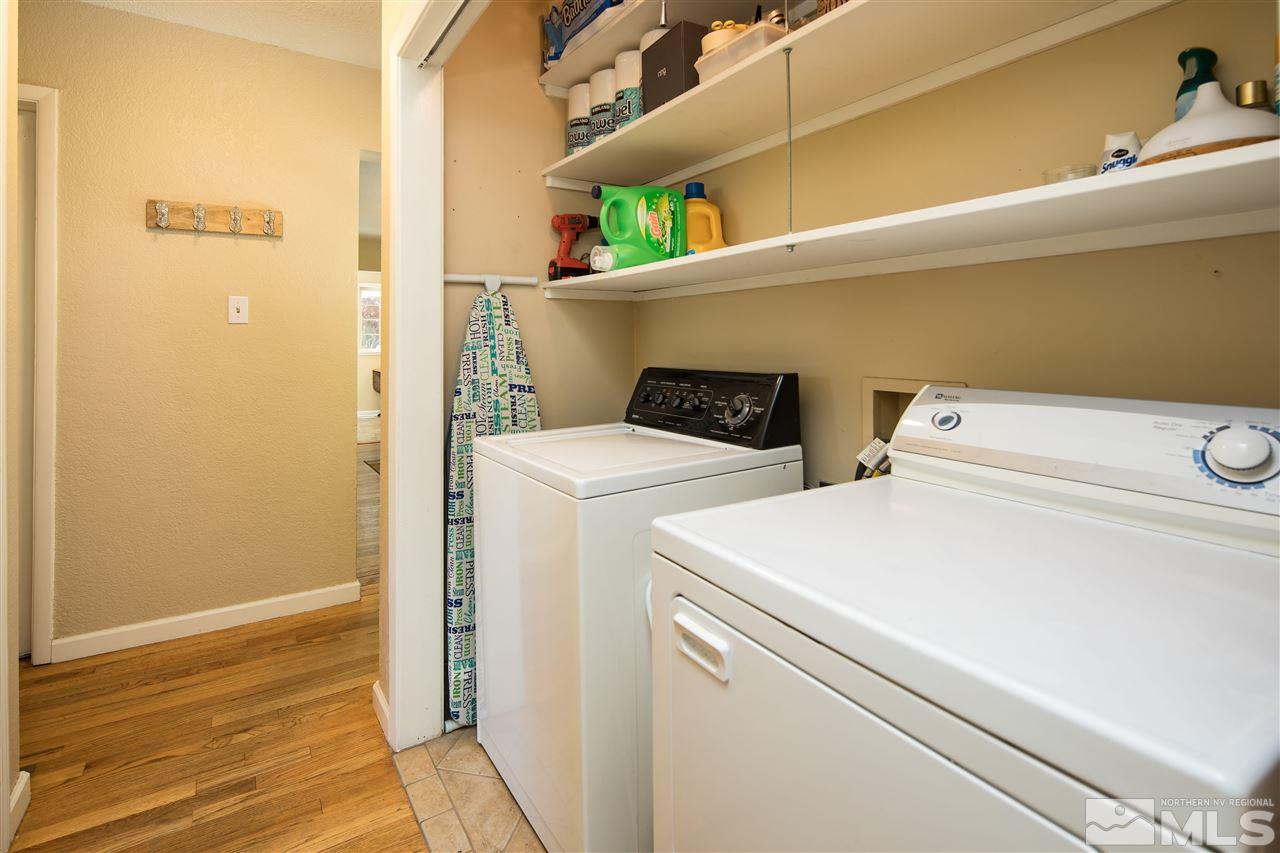 70 Bisby Street Reno, NV 89512 - Photo 19 of 25 a utility room with dryer and washer
