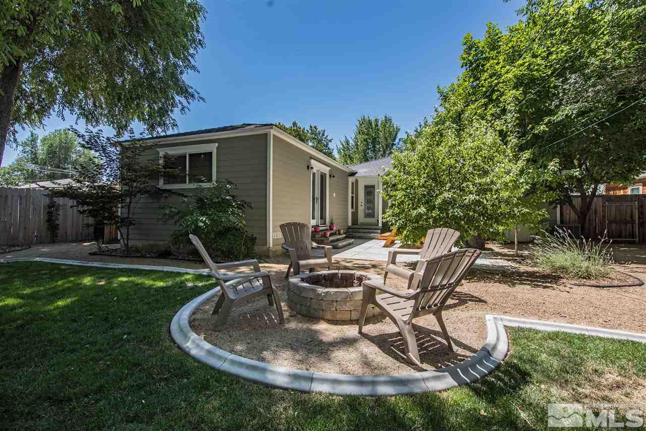70 Bisby Street Reno, NV 89512 - Photo 24 of 25 a view of a house with backyard sitting area and garden