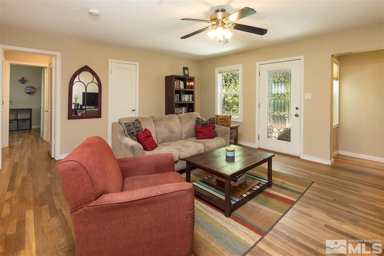 70 Bisby Street Reno, NV 89512 - Photo 3 of 25 a living room with furniture and wooden floor