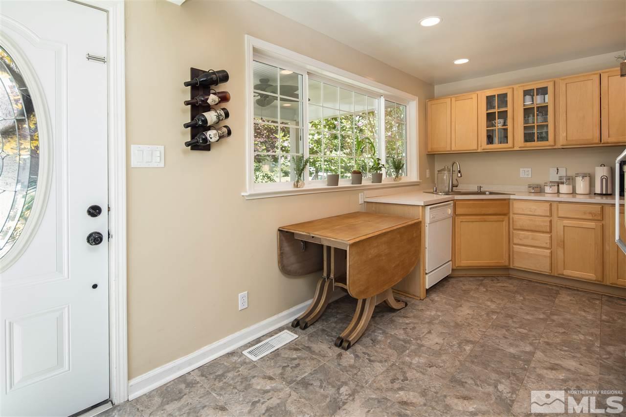 70 Bisby Street Reno, NV 89512 - Photo 6 of 25 a kitchen with a sink appliances and a window