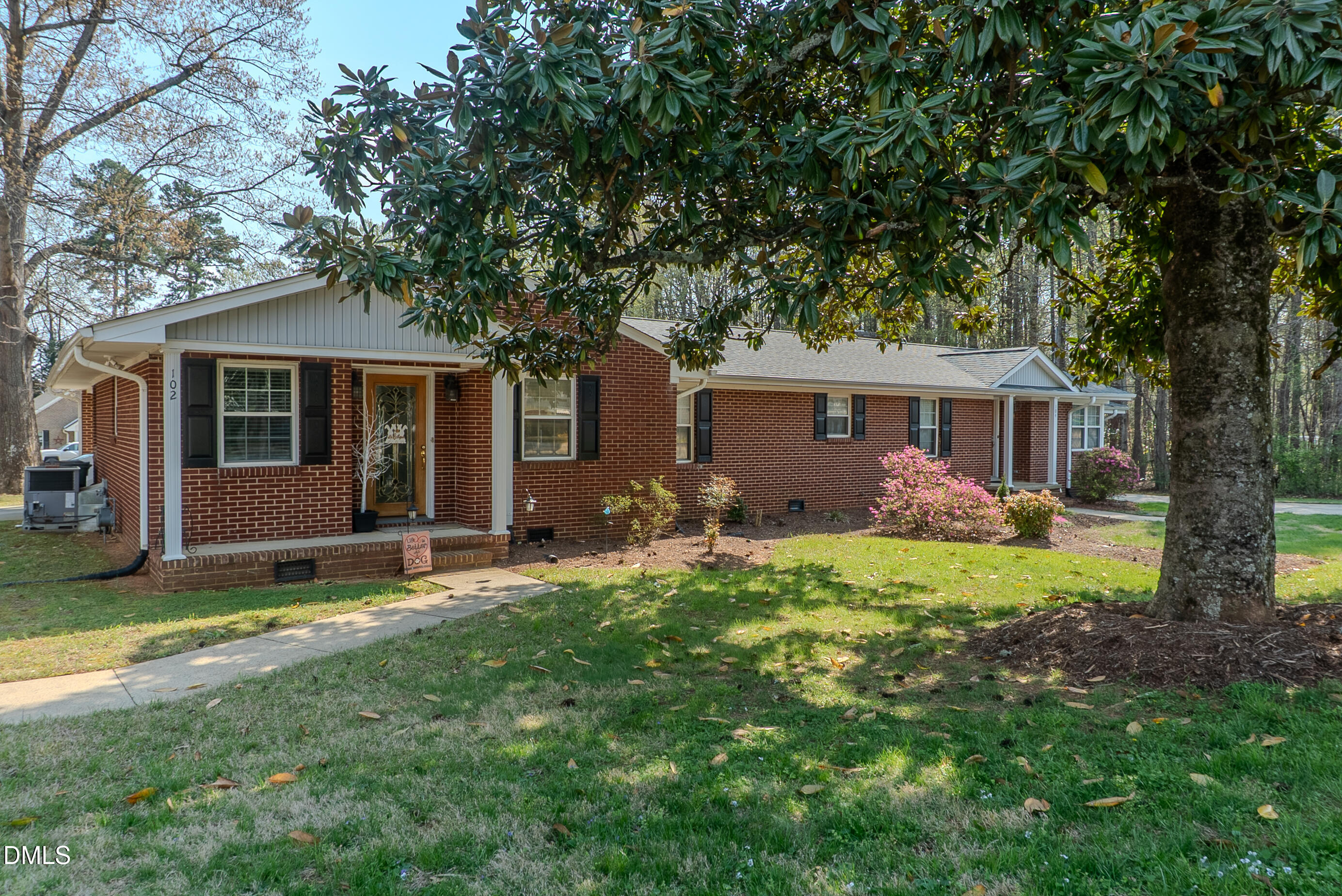 front view of a house with a yard