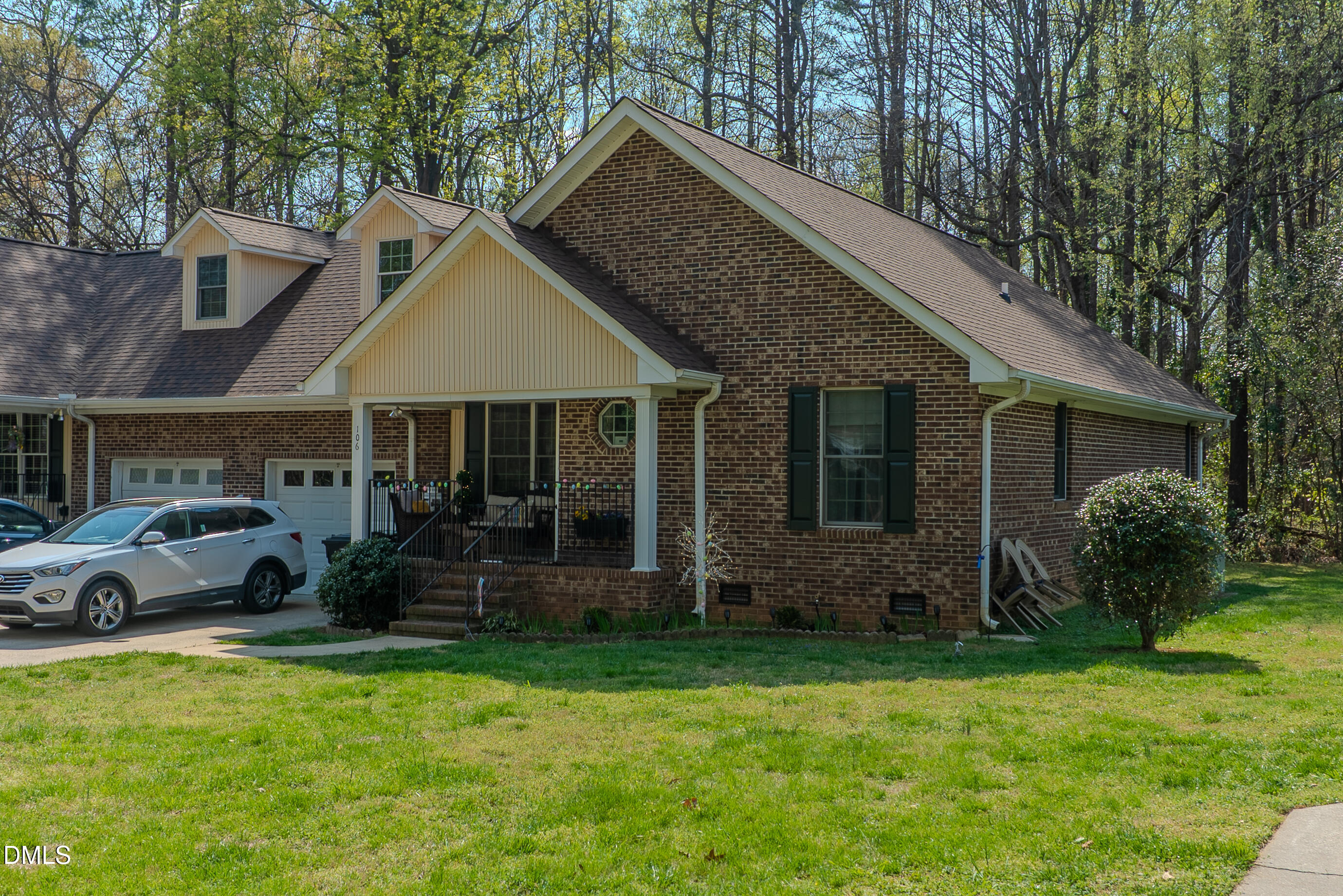 2012 South Mebane Street, Unit 102 Burlington, NC 27215 - Photo 10 of 35 a front view of a house with garden