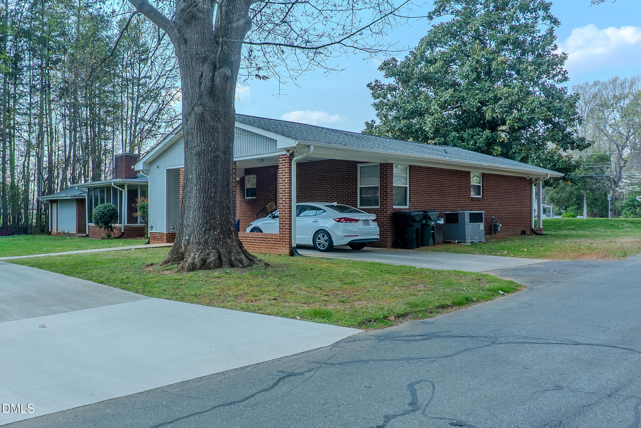 2012 South Mebane Street, Unit 102 Burlington, NC 27215 - Photo 16 of 35 a front view of house with yard and green space