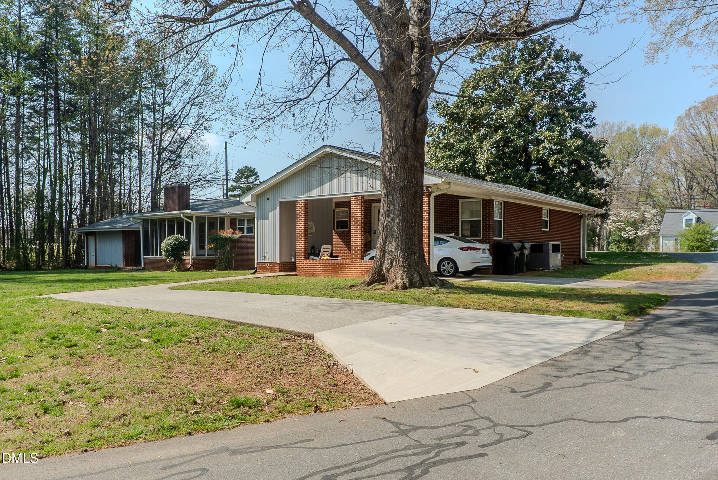 2012 South Mebane Street, Unit 102 Burlington, NC 27215 - Photo 23 of 35 front view of a house with a yard