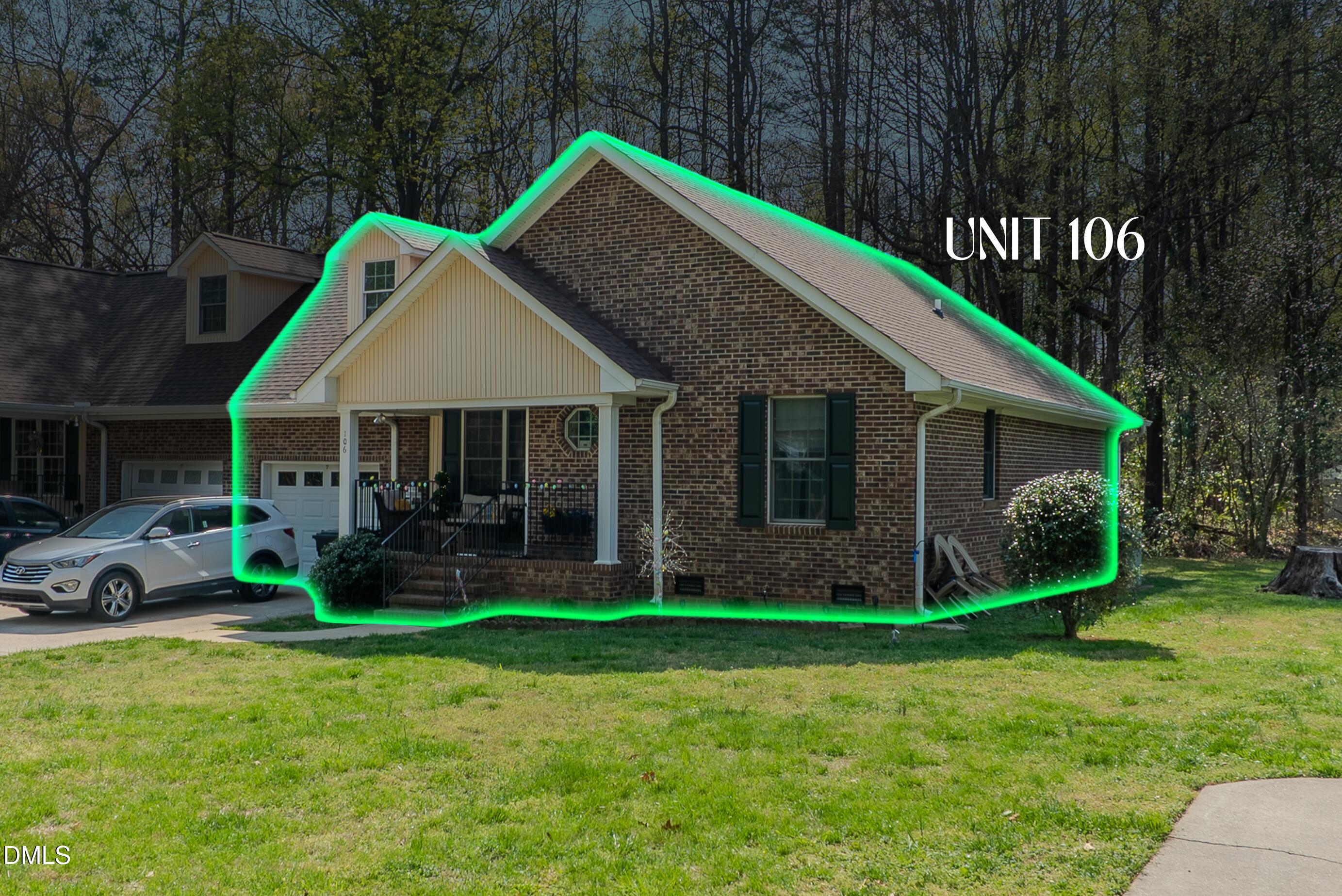 2012 South Mebane Street, Unit 102 Burlington, NC 27215 - Photo 6 of 35 a front view of a house with garden