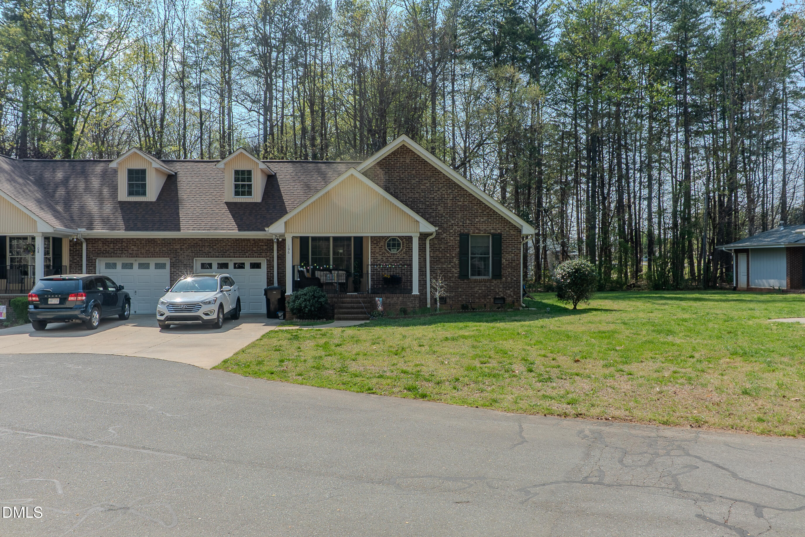 2012 South Mebane Street, Unit 102 Burlington, NC 27215 - Photo 8 of 35 a front view of a house with garden