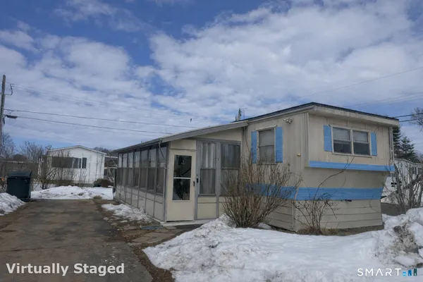 a view of a house with a patio