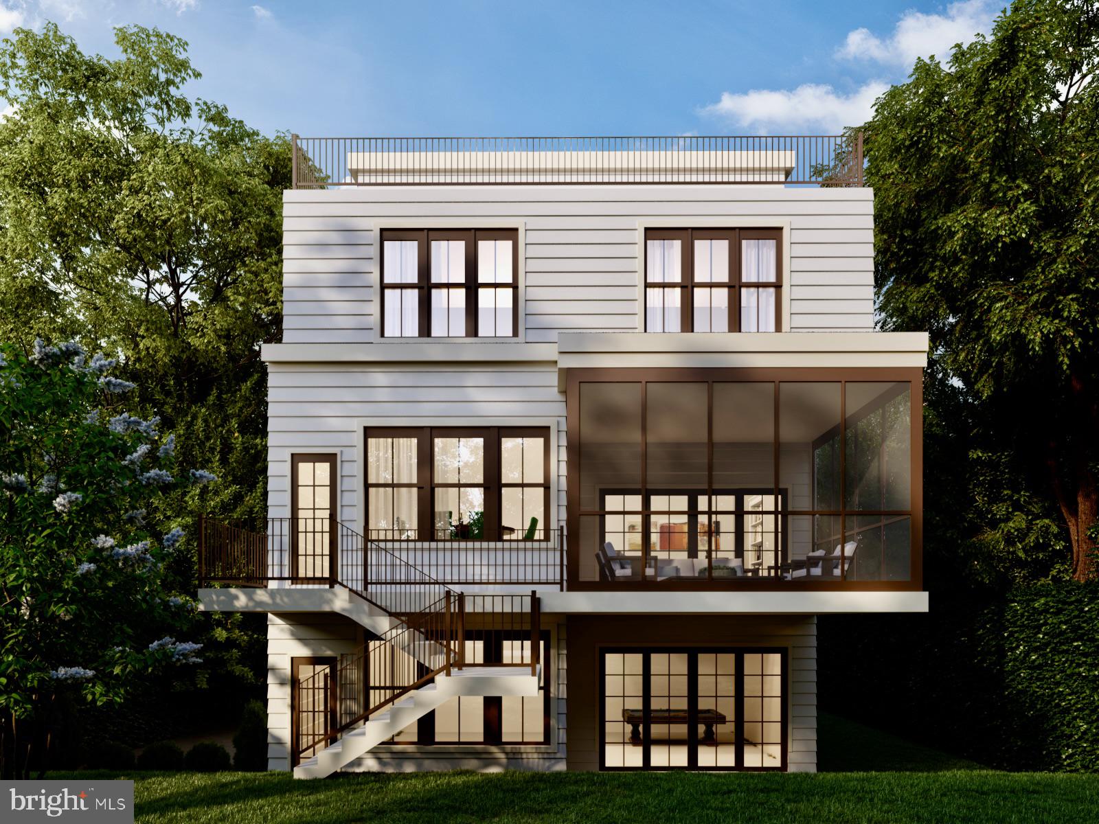 3141 Aberfoyle Place Northwest Washington, DC 20015 - Photo 2 of 3 a front view of a house with a garden