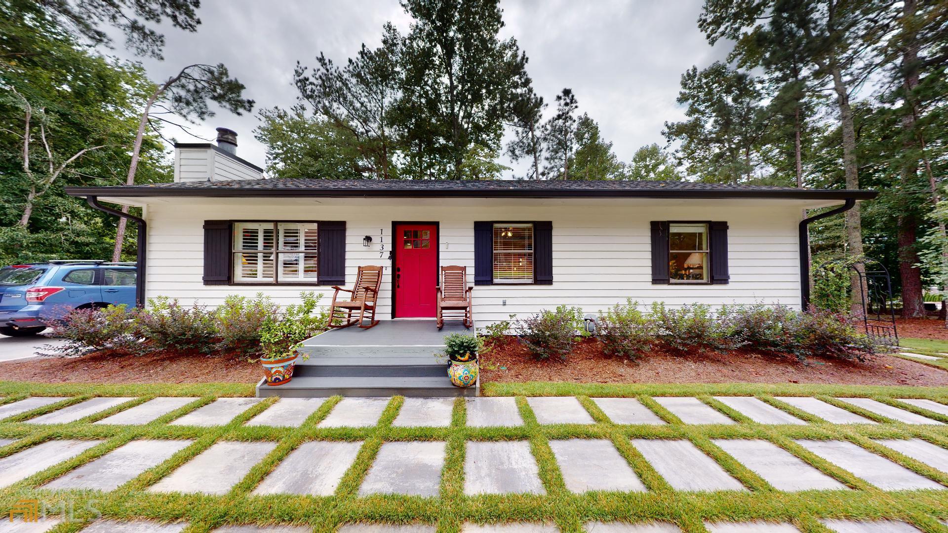 1137 Magnolia Drive Villa Rica, GA 30180 - Photo 2 of 44 a view of backyard with a patio