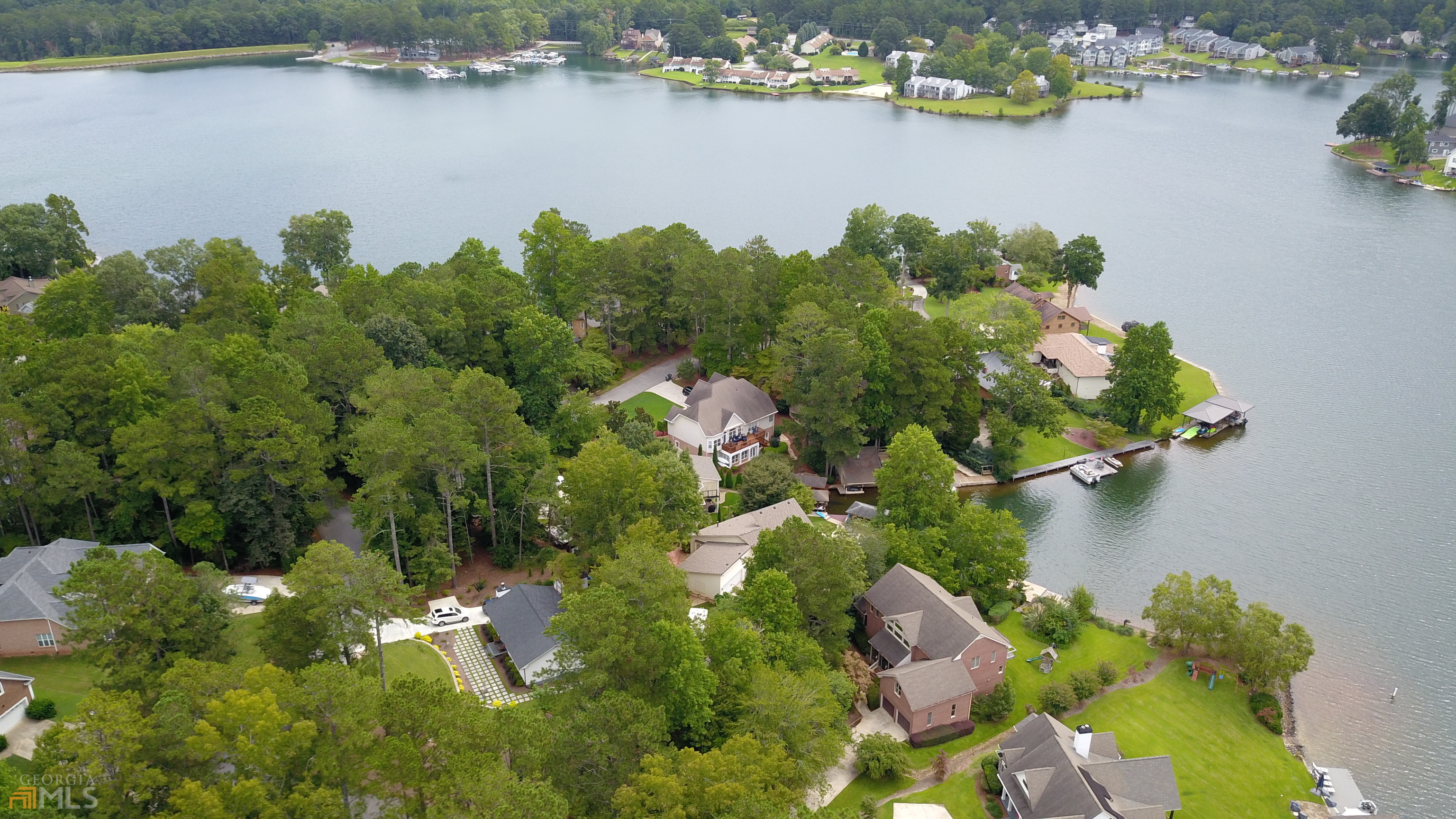 1137 Magnolia Drive Villa Rica, GA 30180 - Photo 25 of 44 an aerial view of lake residential house with outdoor space and trees around