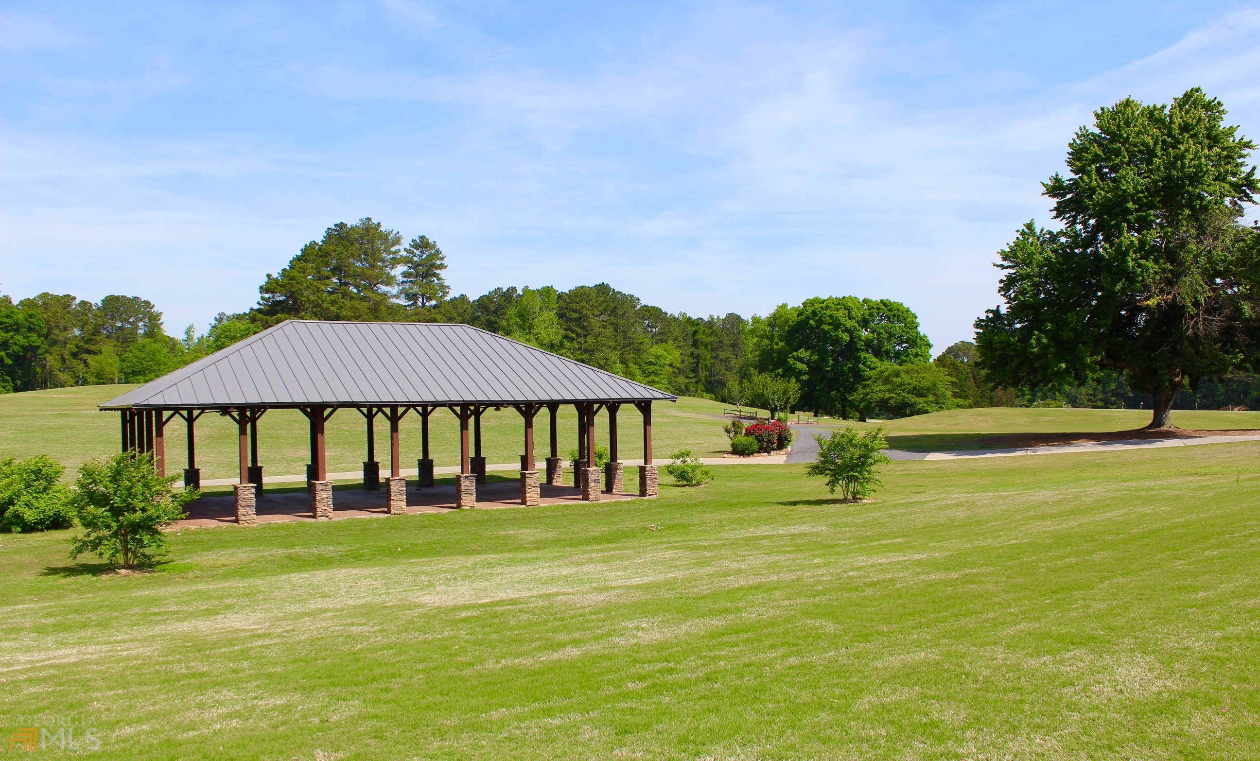 1137 Magnolia Drive Villa Rica, GA 30180 - Photo 31 of 44 a view of a swimming pool with a yard