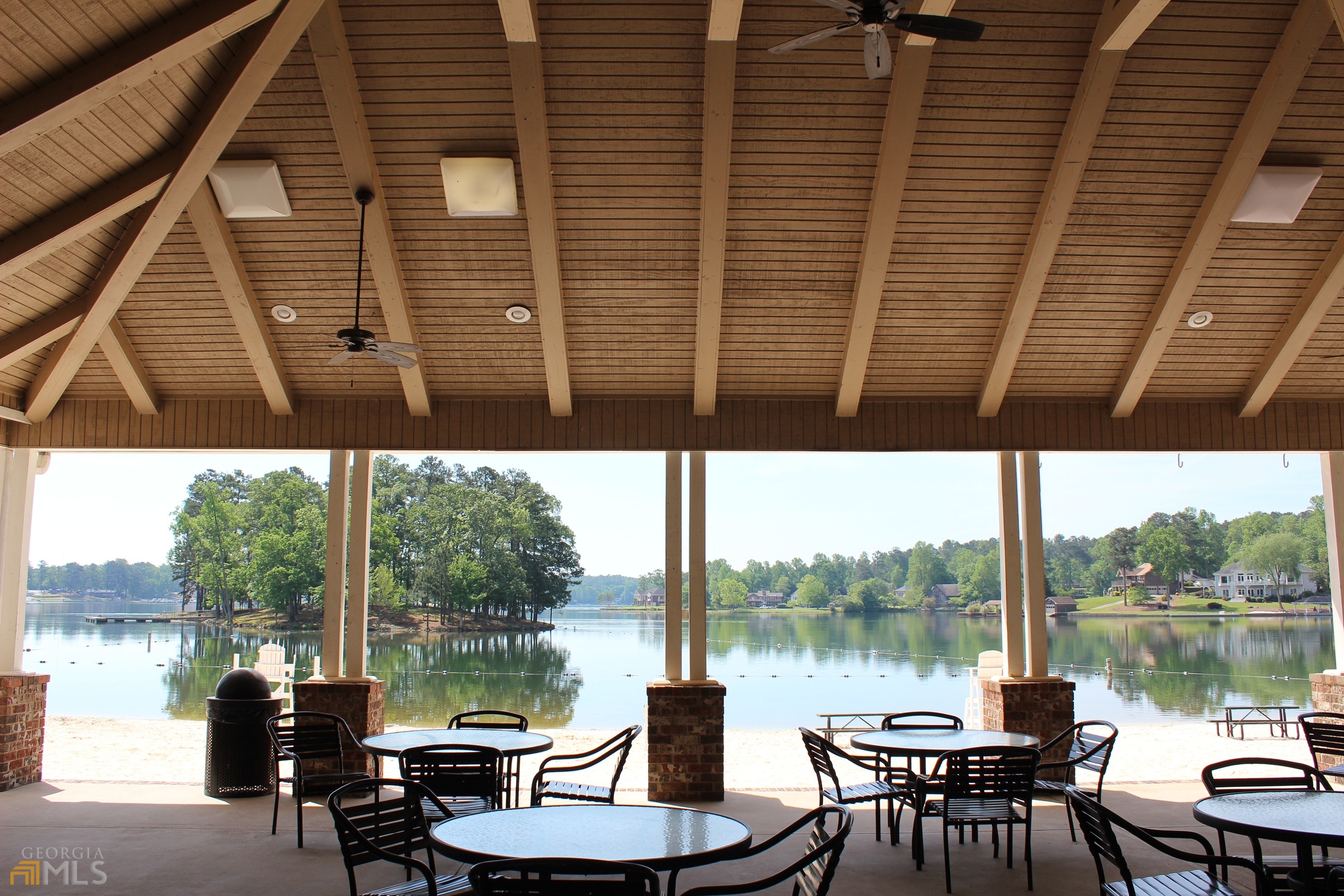 1137 Magnolia Drive Villa Rica, GA 30180 - Photo 34 of 44 a view of a lake from a balcony with furniture
