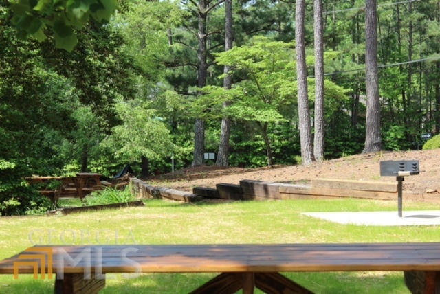 1137 Magnolia Drive Villa Rica, GA 30180 - Photo 39 of 44 a view of a backyard with swimming pool