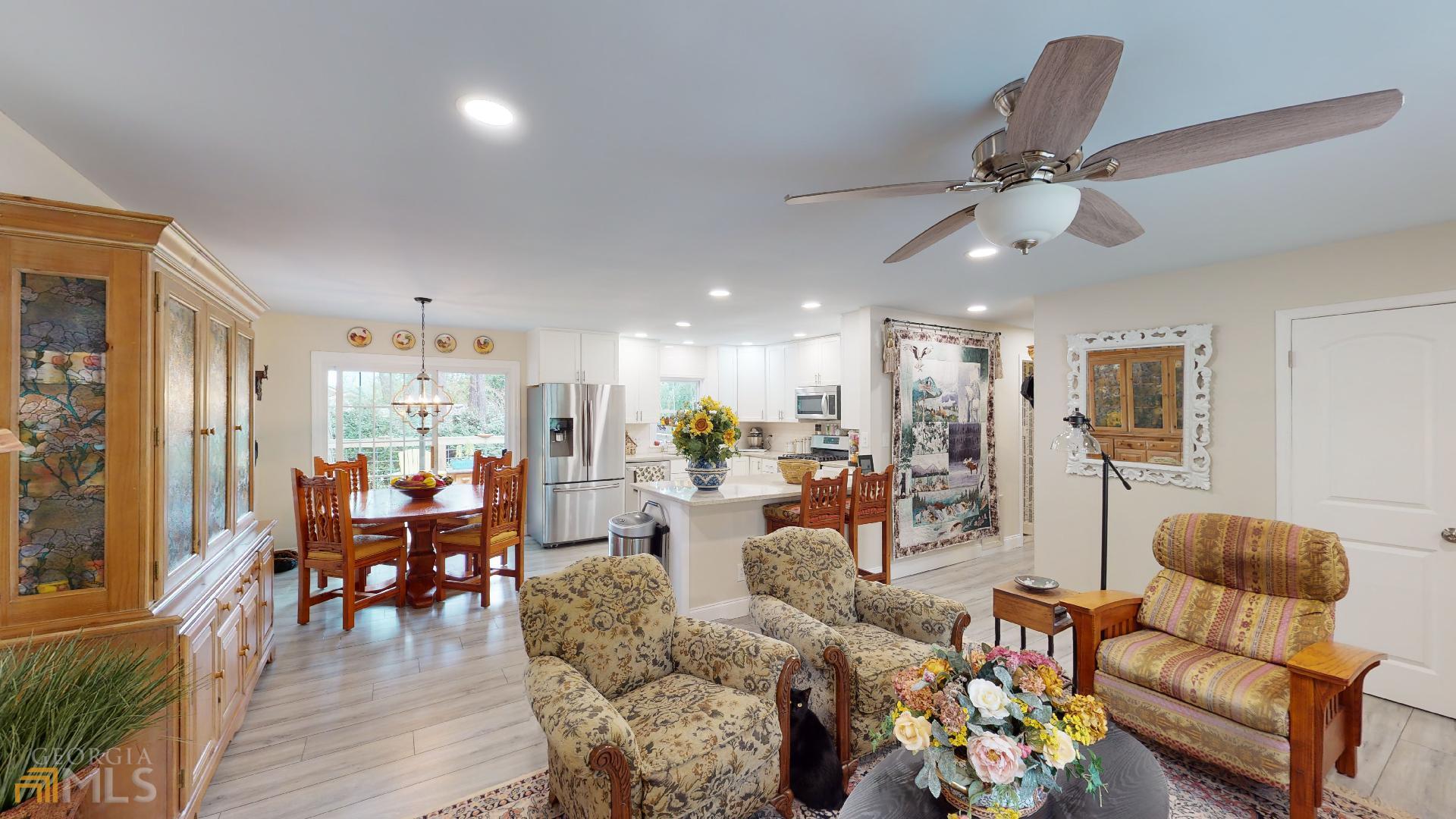 1137 Magnolia Drive Villa Rica, GA 30180 - Photo 7 of 44 a living room with furniture and wooden floor