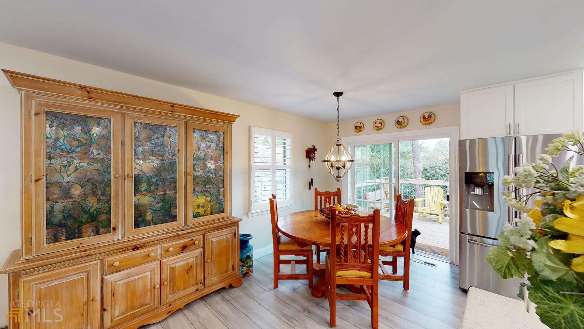 1137 Magnolia Drive Villa Rica, GA 30180 - Photo 8 of 44 a view of a dining room with furniture window and outside view