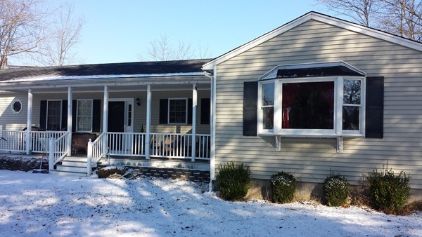 3 Sand Hill Road Salisbury, MA 01952 - Photo 1 of 15 a front view of a house with a yard