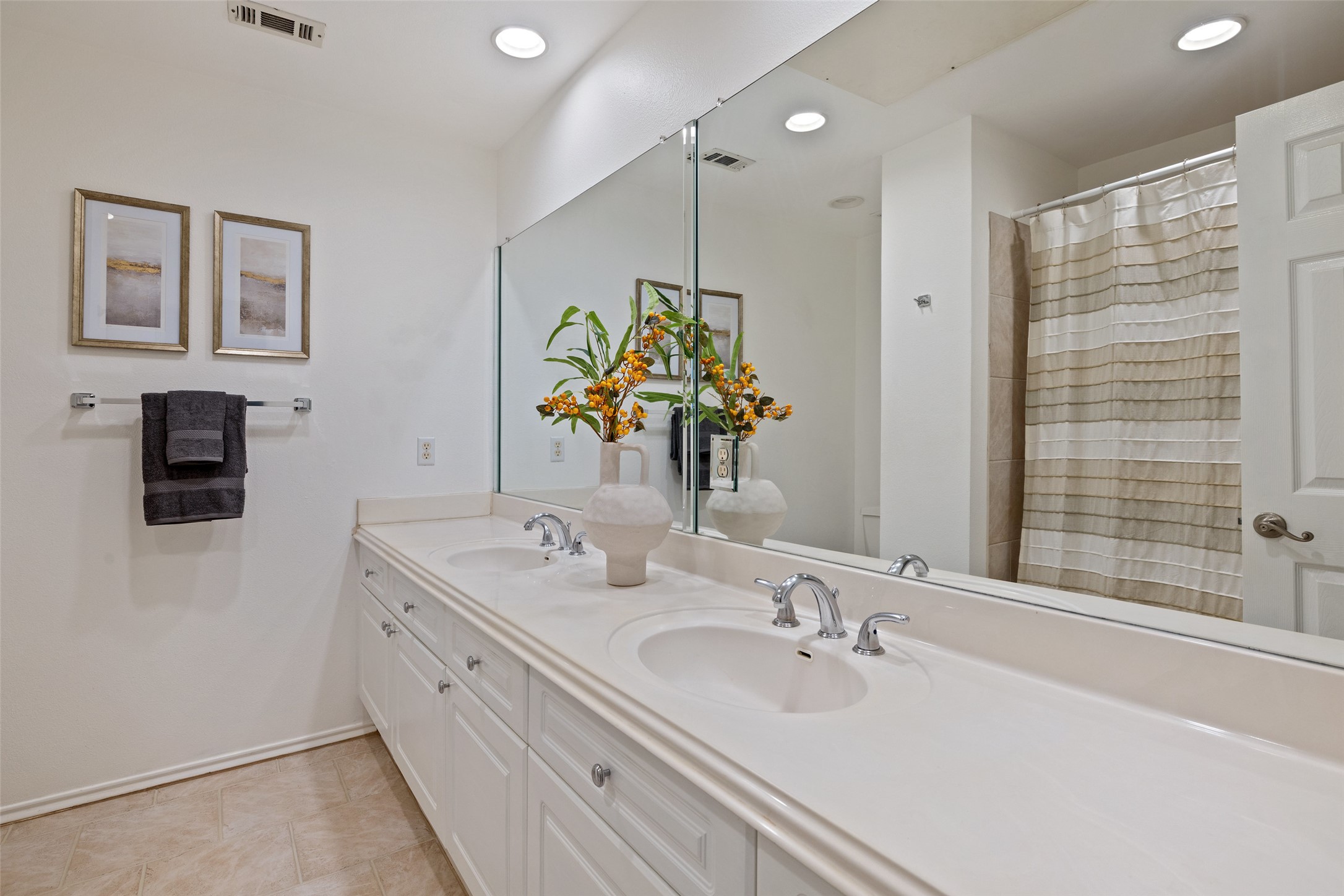 2918 Ranch To Market Road 620, Unit O282 Austin, TX 78734 - Photo 22 of 40 Bathroom with visible vents, baseboards, and a sink