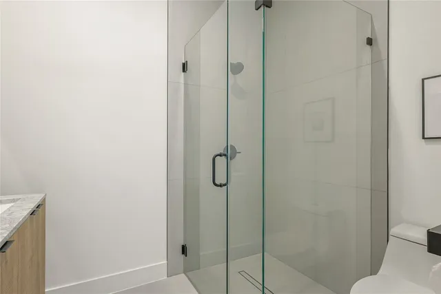 an entryway and livingroom with furniture