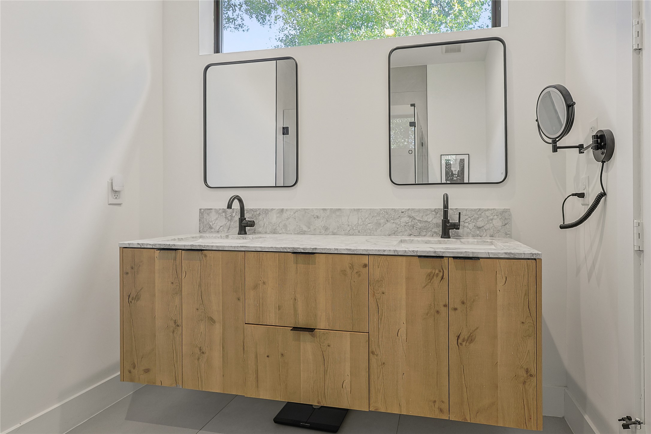 1550 Ashway Street Conroe, TX 77385 - Photo 22 of 34 a bathroom with a granite countertop sink and a mirror