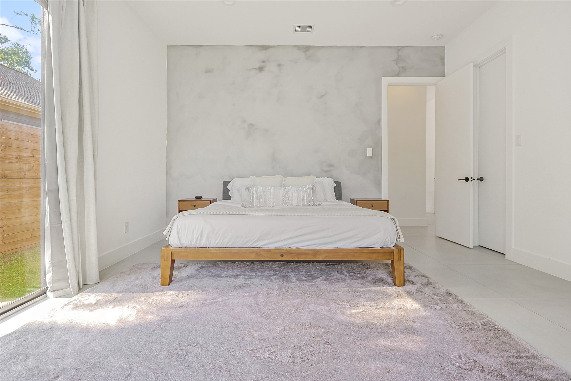 1550 Ashway Street Conroe, TX 77385 - Photo 26 of 34 a bedroom with a bed and a window