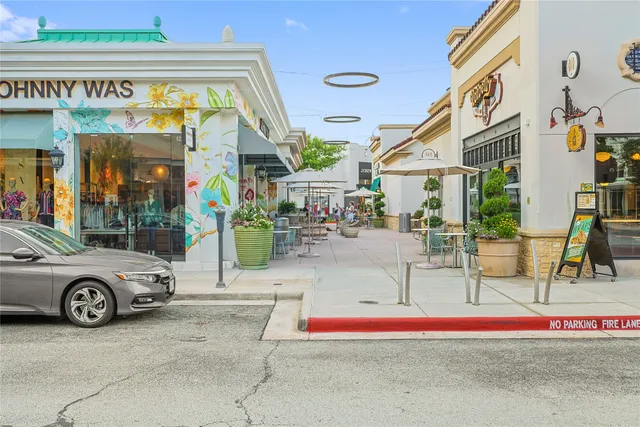 a view of a building with a street