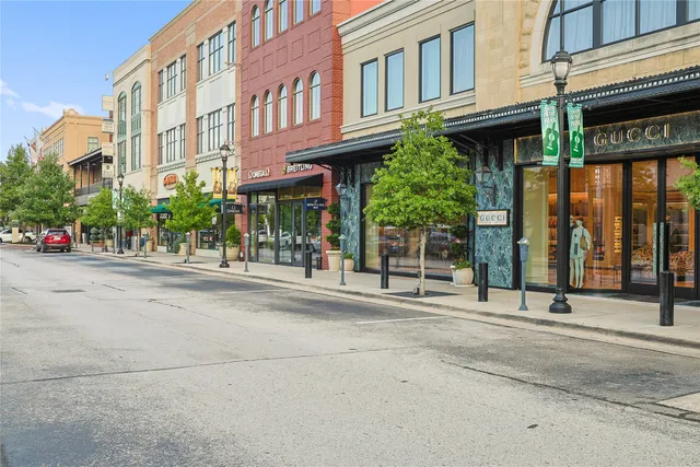 a street sign on a tree