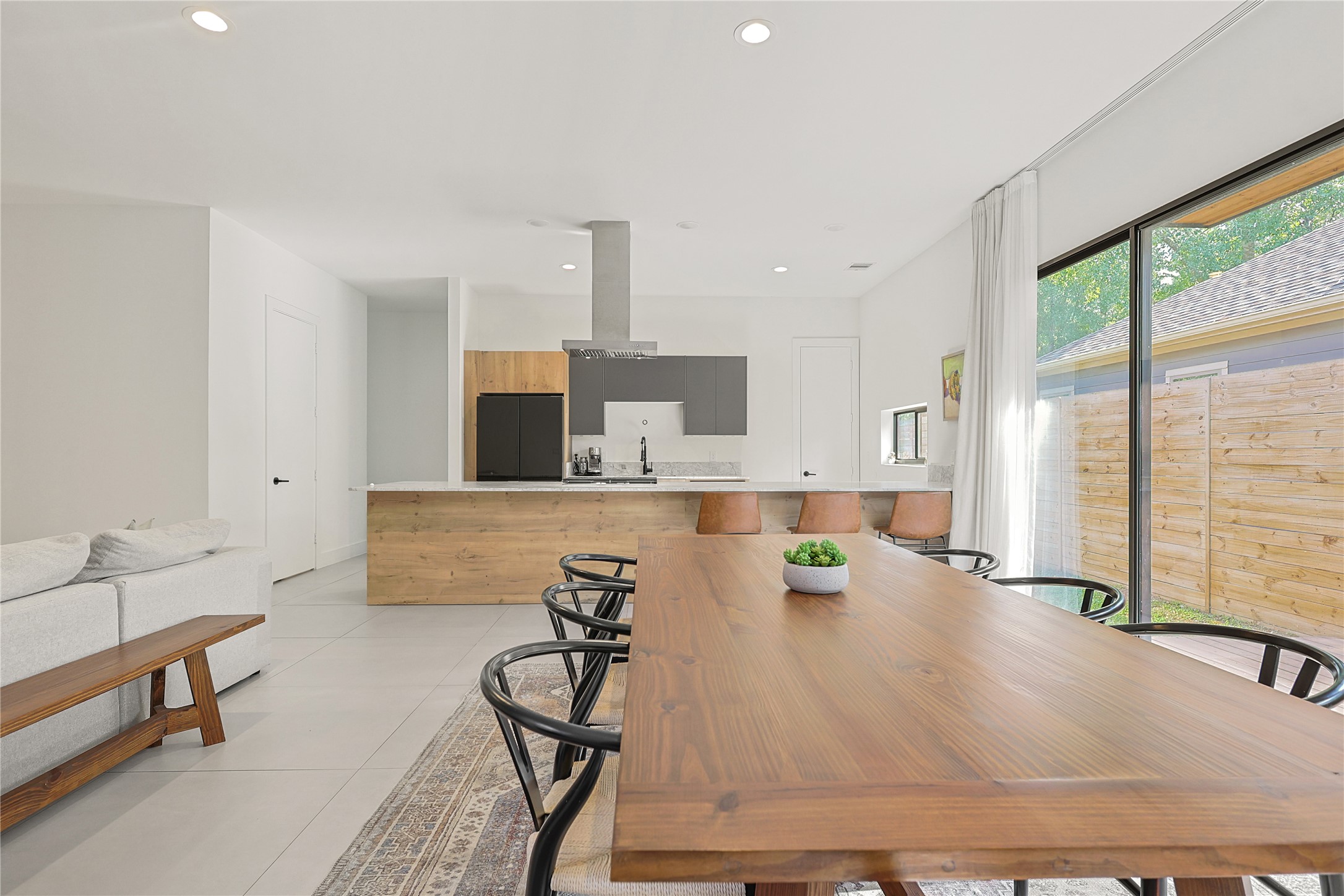 1550 Ashway Street Conroe, TX 77385 - Photo 4 of 34 a living room with furniture and a large window