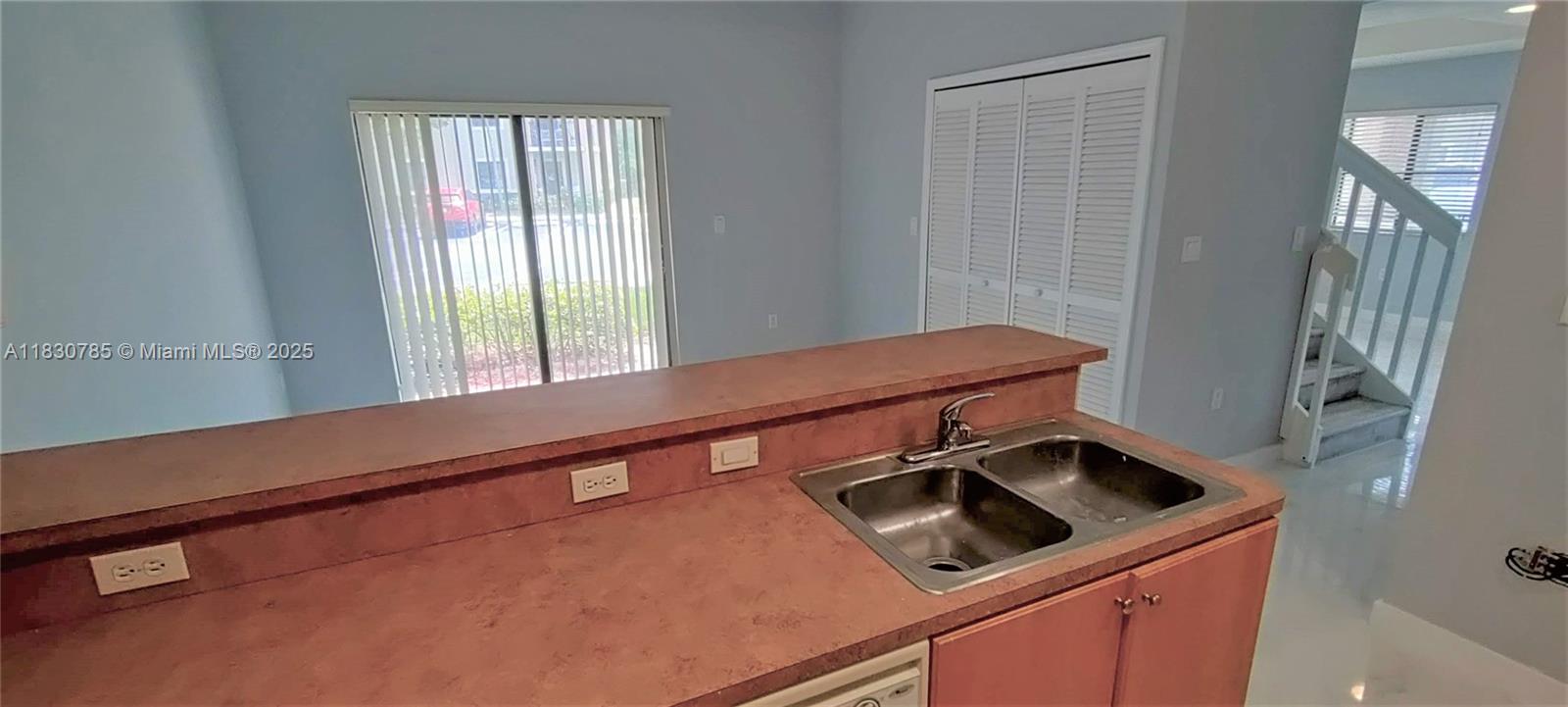 22911 Southwest 88th Place, Unit 721 Cutler Bay, FL 33190 - Photo 14 of 20 a utility room with dryer and washer