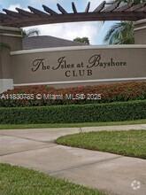 22911 Southwest 88th Place, Unit 721 Cutler Bay, FL 33190 - Photo 17 of 20 a view of a sign board