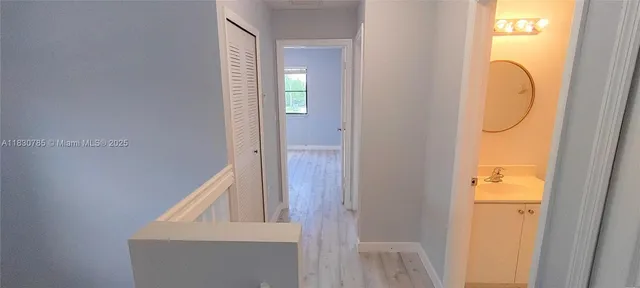 a view of front door with hallway