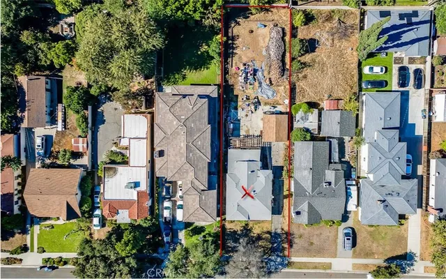 an aerial view of streets and trees