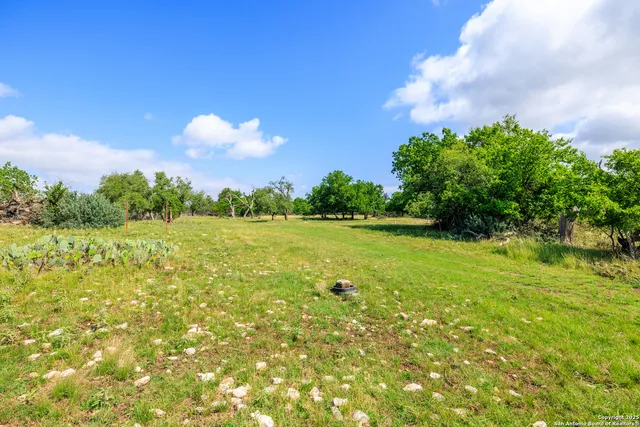 a view of outdoor space with deck and yard