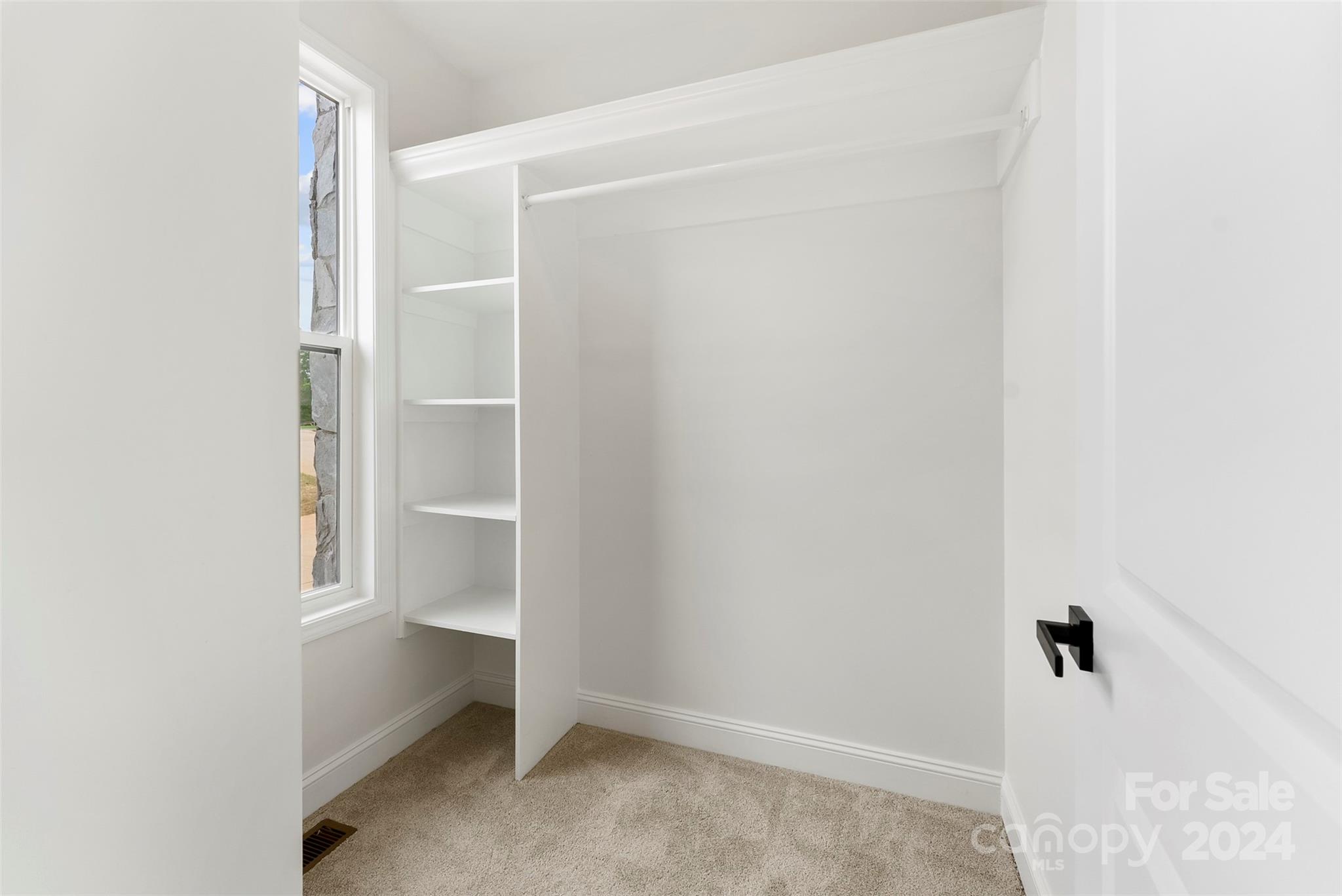 1129 Stoney Point Road Kings Mountain, NC 28086 - Photo 11 of 45 a view of an empty walk in closet
