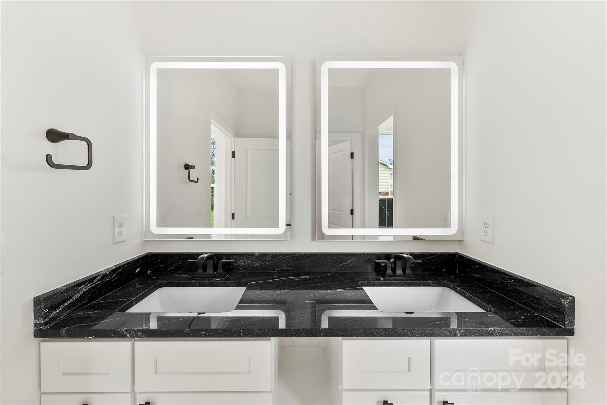 1129 Stoney Point Road Kings Mountain, NC 28086 - Photo 13 of 45 a bathroom with a sink and cabinets