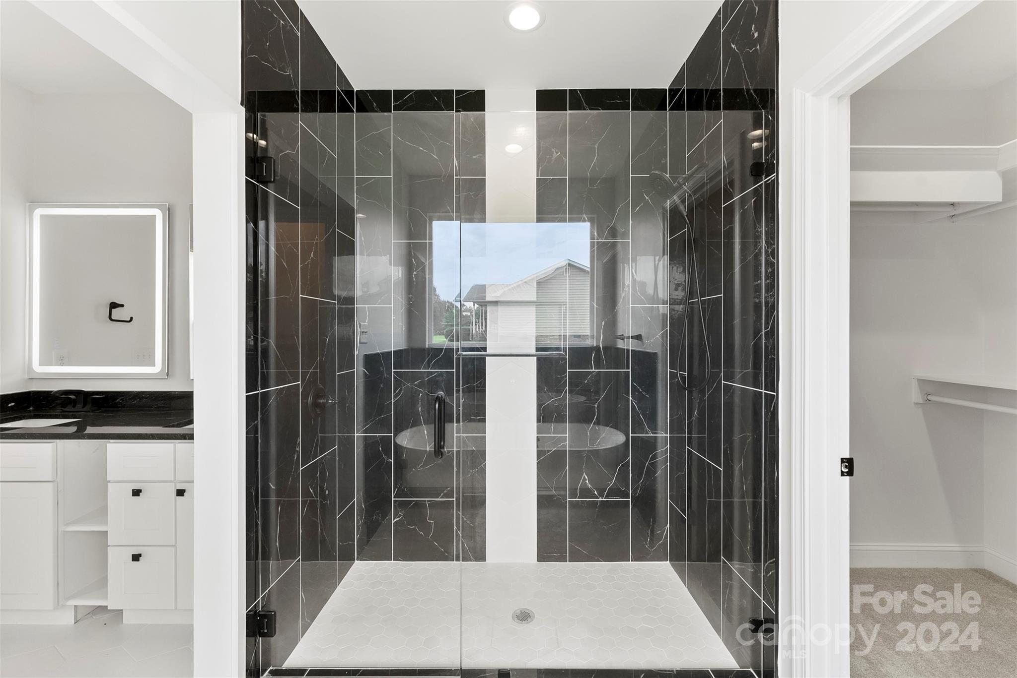 1129 Stoney Point Road Kings Mountain, NC 28086 - Photo 14 of 45 a bathroom with a shower and a sink
