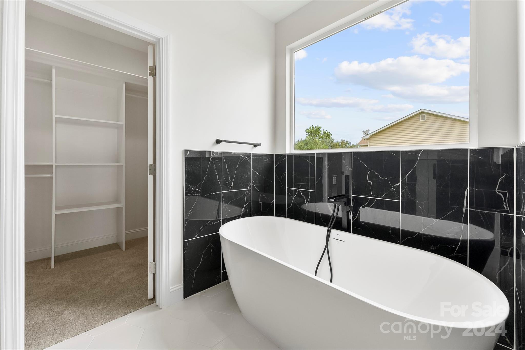 1129 Stoney Point Road Kings Mountain, NC 28086 - Photo 15 of 45 a bathroom with a bathtub and shower