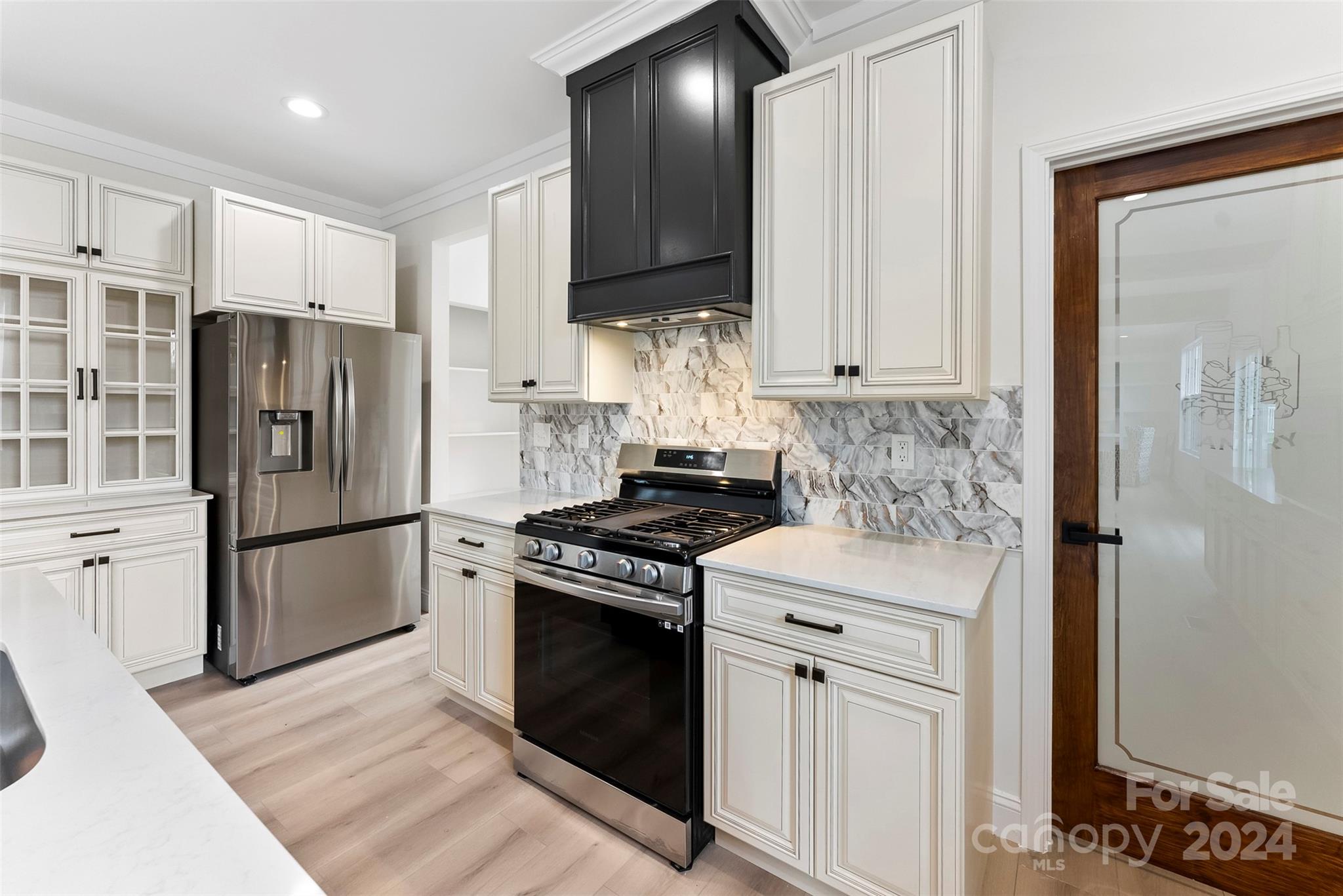 1129 Stoney Point Road Kings Mountain, NC 28086 - Photo 25 of 45 a kitchen with stainless steel appliances granite countertop a refrigerator stove and sink