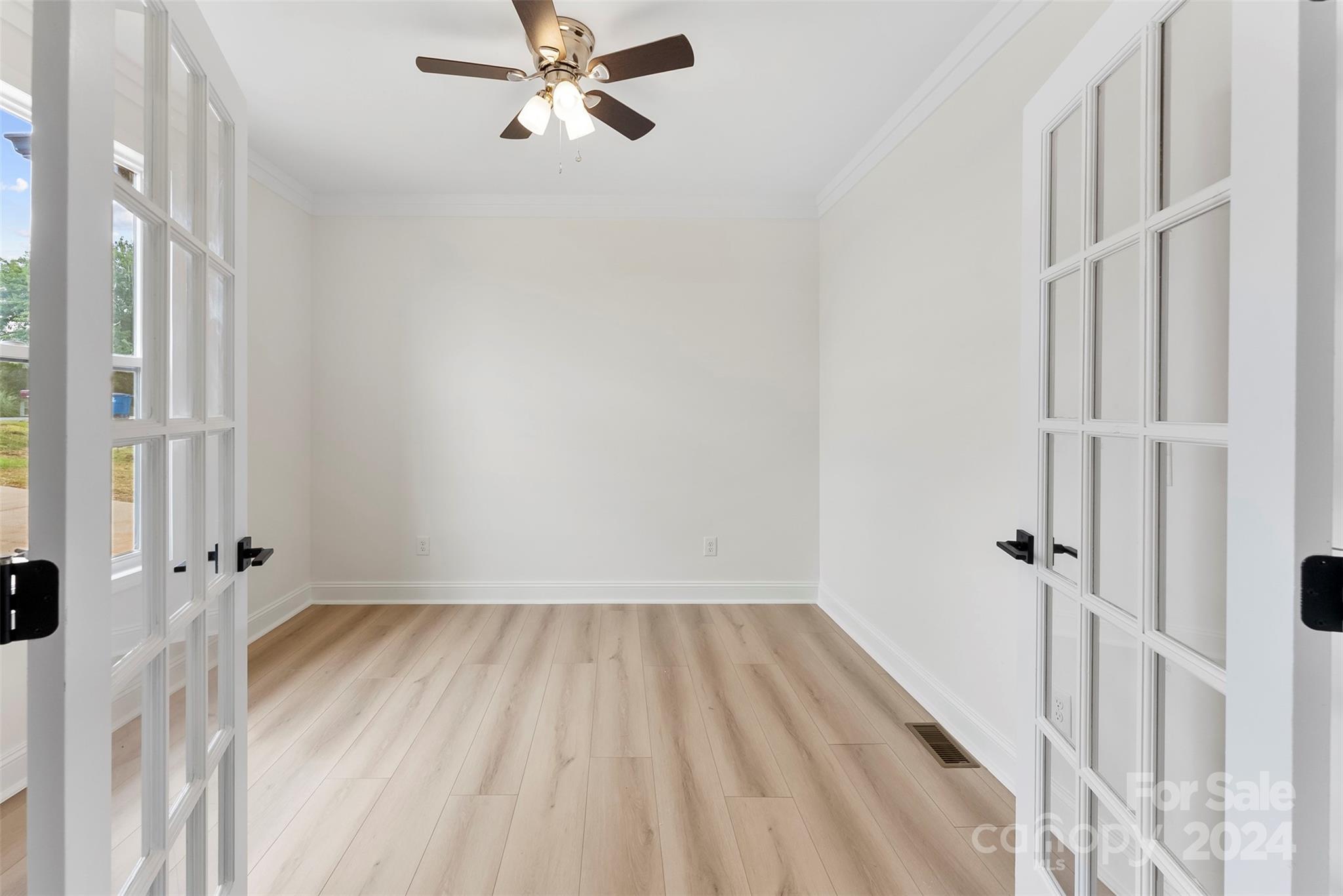 1129 Stoney Point Road Kings Mountain, NC 28086 - Photo 6 of 45 a view of a room with wooden floor and a window