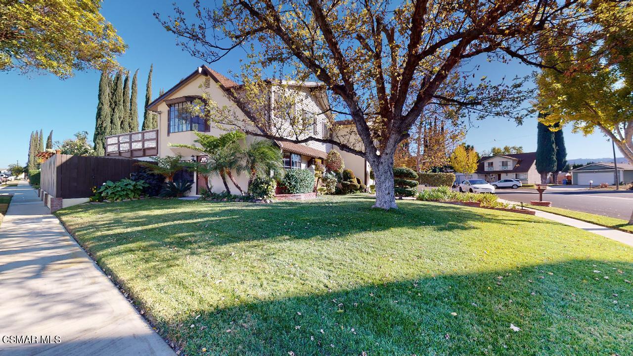 2007 Rhoda Street Simi Valley, CA 93065 - Photo 1 of 52 a front view of a house with a yard table and chairs