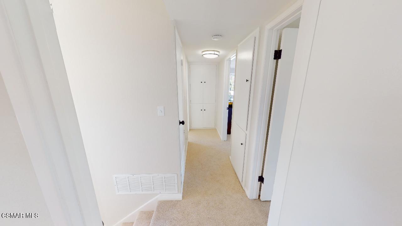 2007 Rhoda Street Simi Valley, CA 93065 - Photo 24 of 52 a view of a hallway with shelves