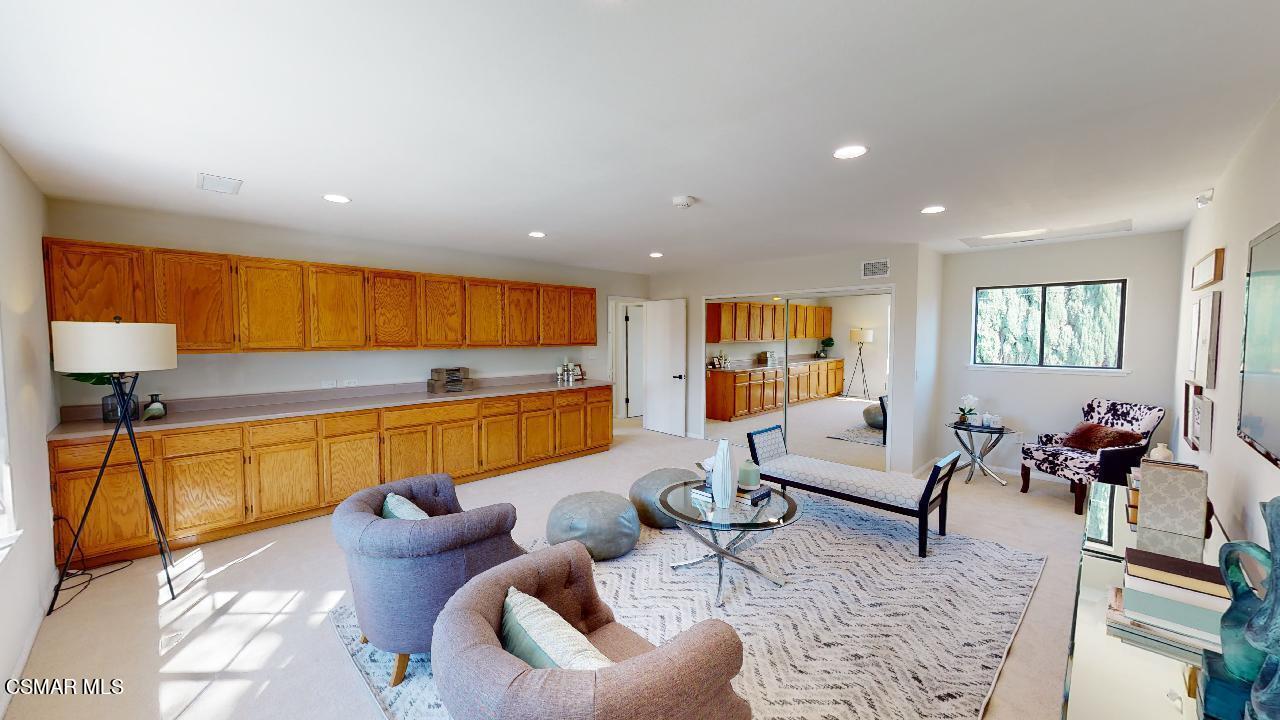 2007 Rhoda Street Simi Valley, CA 93065 - Photo 28 of 52 a living room with furniture kitchen view and a large window