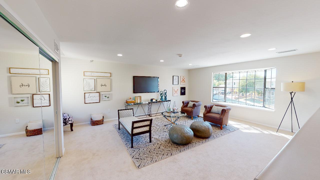 2007 Rhoda Street Simi Valley, CA 93065 - Photo 31 of 52 a living room with furniture and a flat screen tv