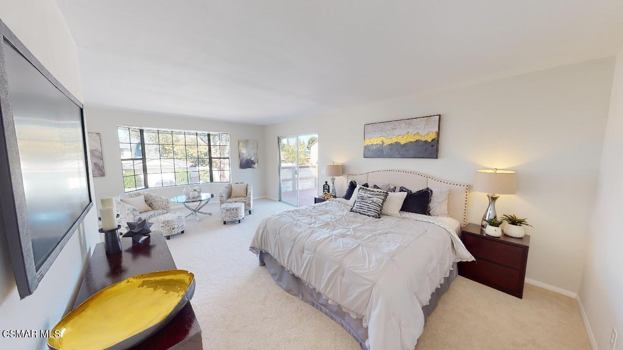 2007 Rhoda Street Simi Valley, CA 93065 - Photo 33 of 52 a bed room with a bed mirror and a window