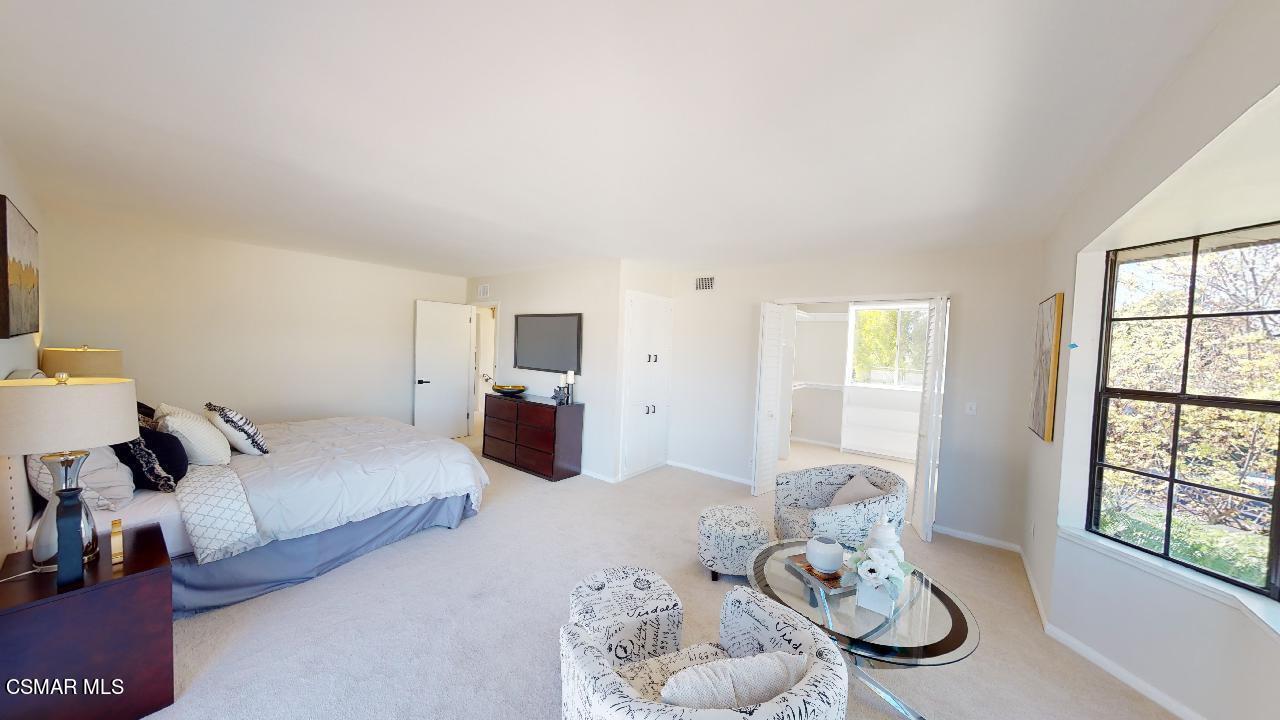 2007 Rhoda Street Simi Valley, CA 93065 - Photo 38 of 52 a living room with furniture chess table and a window