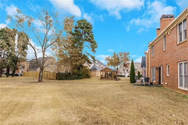 a view of a street with a building in the background