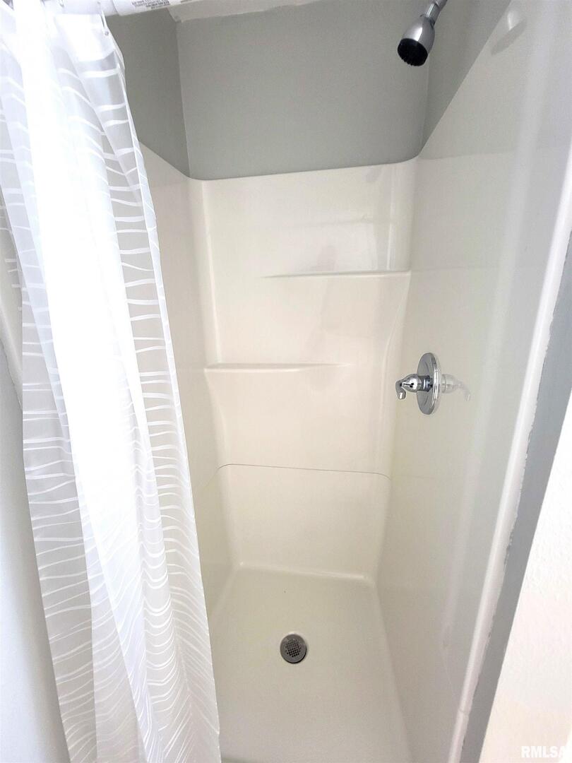 306 Bible Street Flora, IL 62839 - Photo 66 of 87 a bathroom with a shower