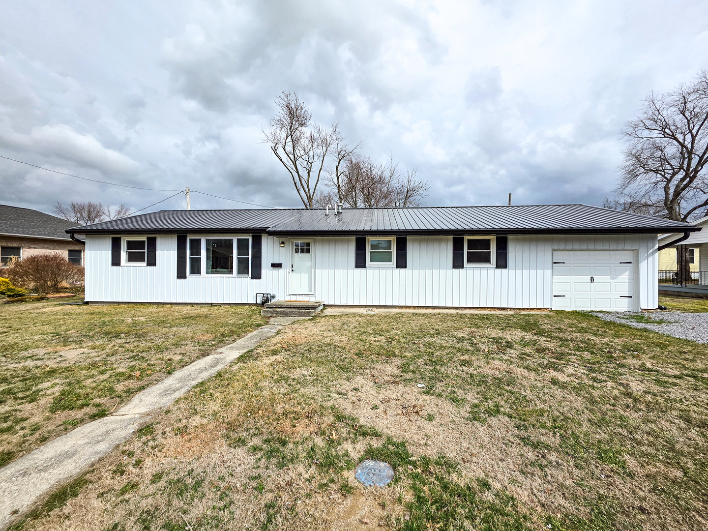 306 Bible Street Flora, IL 62839 - Photo 87 of 87 a house with huge green field in front of it
