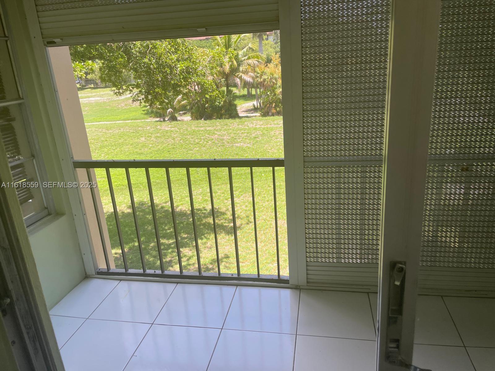 4168 Inverrary Drive, Unit 302 Lauderhill, FL 33319 - Photo 25 of 25 a view of a room with a large window